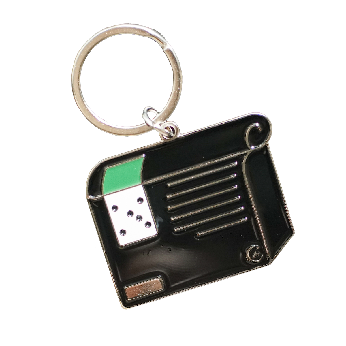 Front side of an enamel keychain styled to look like a retail bag of Commonplace Coffee's Heartmender Espresso. 