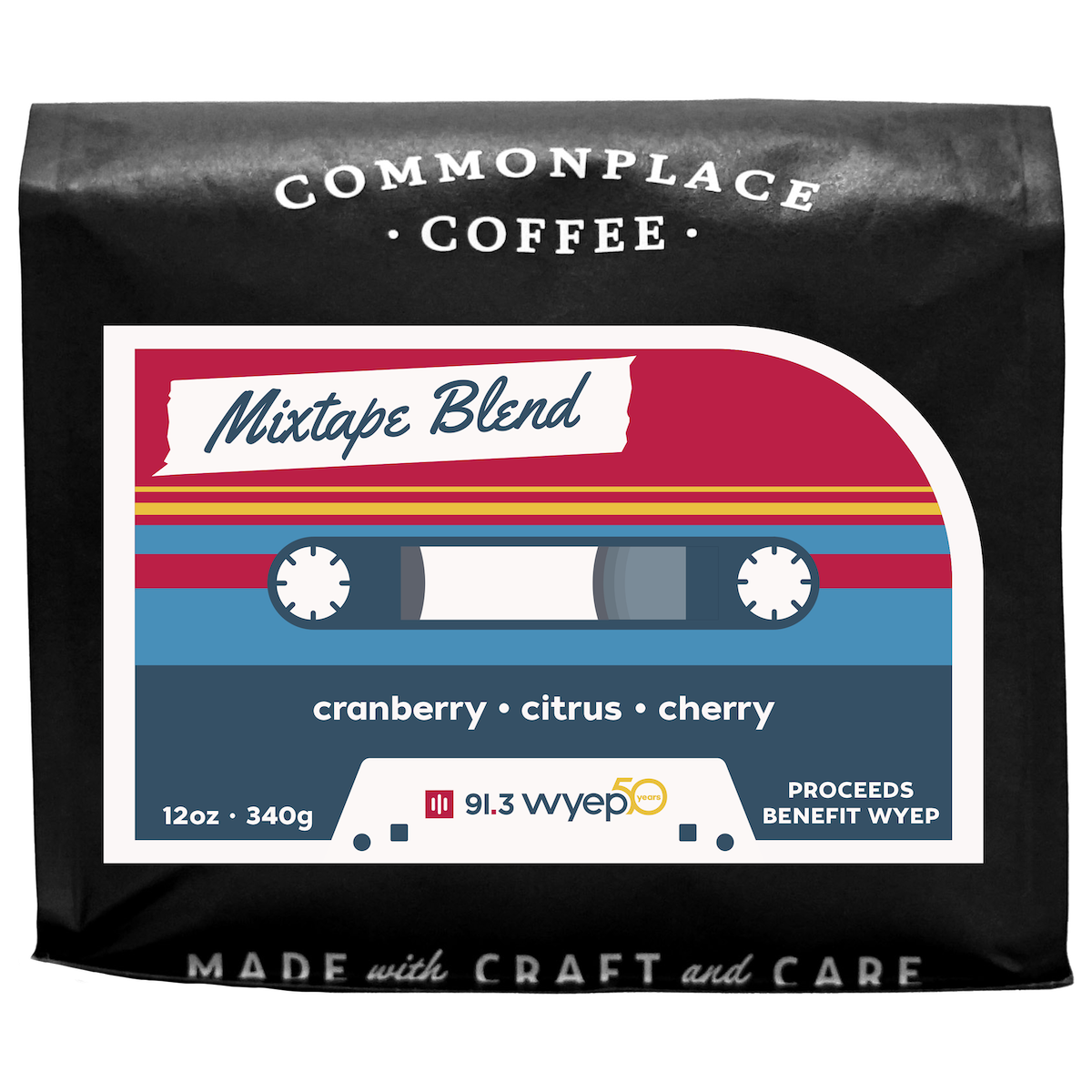 A black bag of 12oz Mixtape Blend from Commonplace Coffee. The label is red, yellow, and blue, and looks like a retro cassette tape.