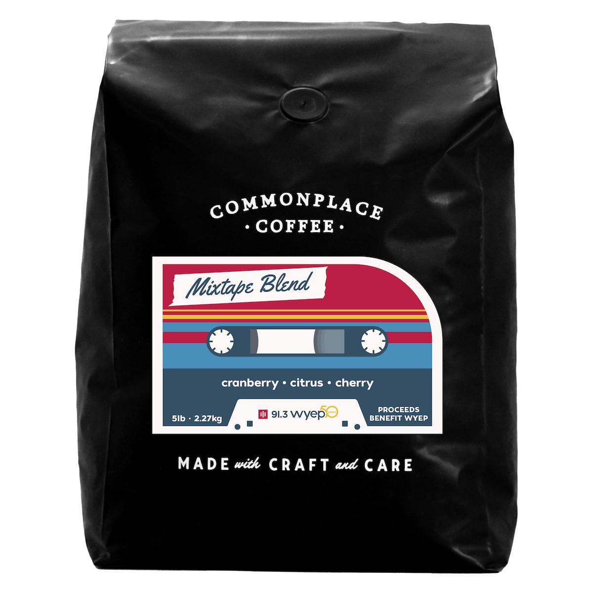 A black bag of 5lb Mixtape Blend from Commonplace Coffee. The label is red, yellow, and blue, and looks like a retro cassette tape.